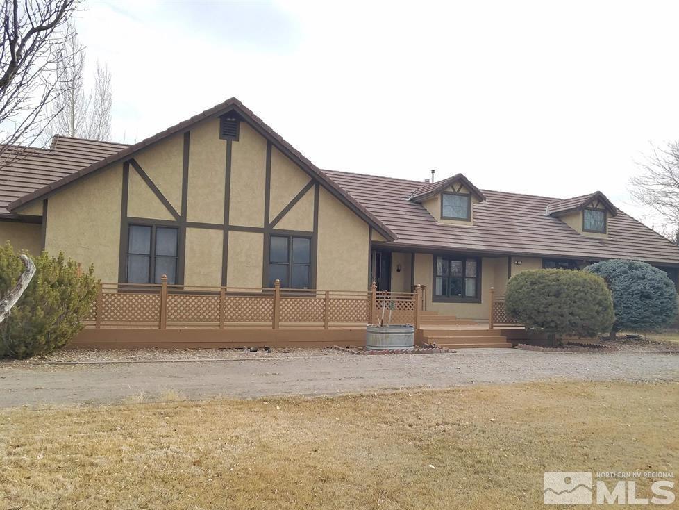 2767 Lone Tree Road Fallon, NV 89406 - Photo 1 of 1 a front view of a house with a yard
