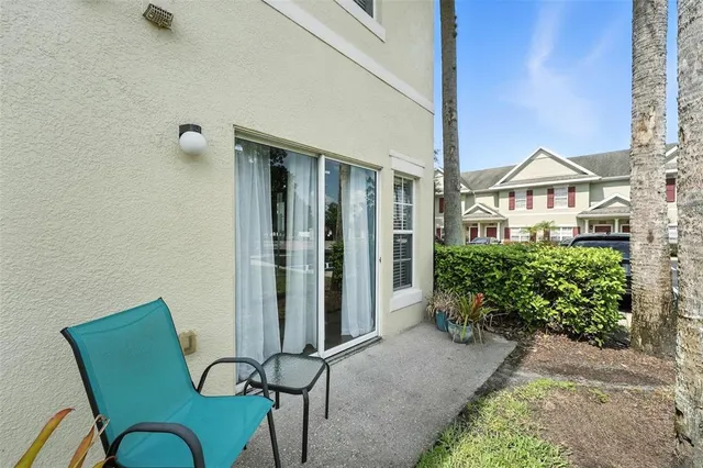 a view of a porch with seating space