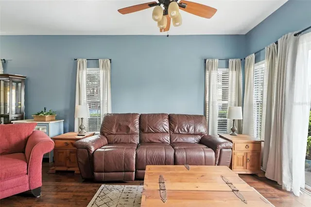 a living room with furniture and a window