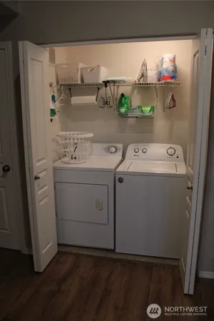 a utility room with dryer and washer