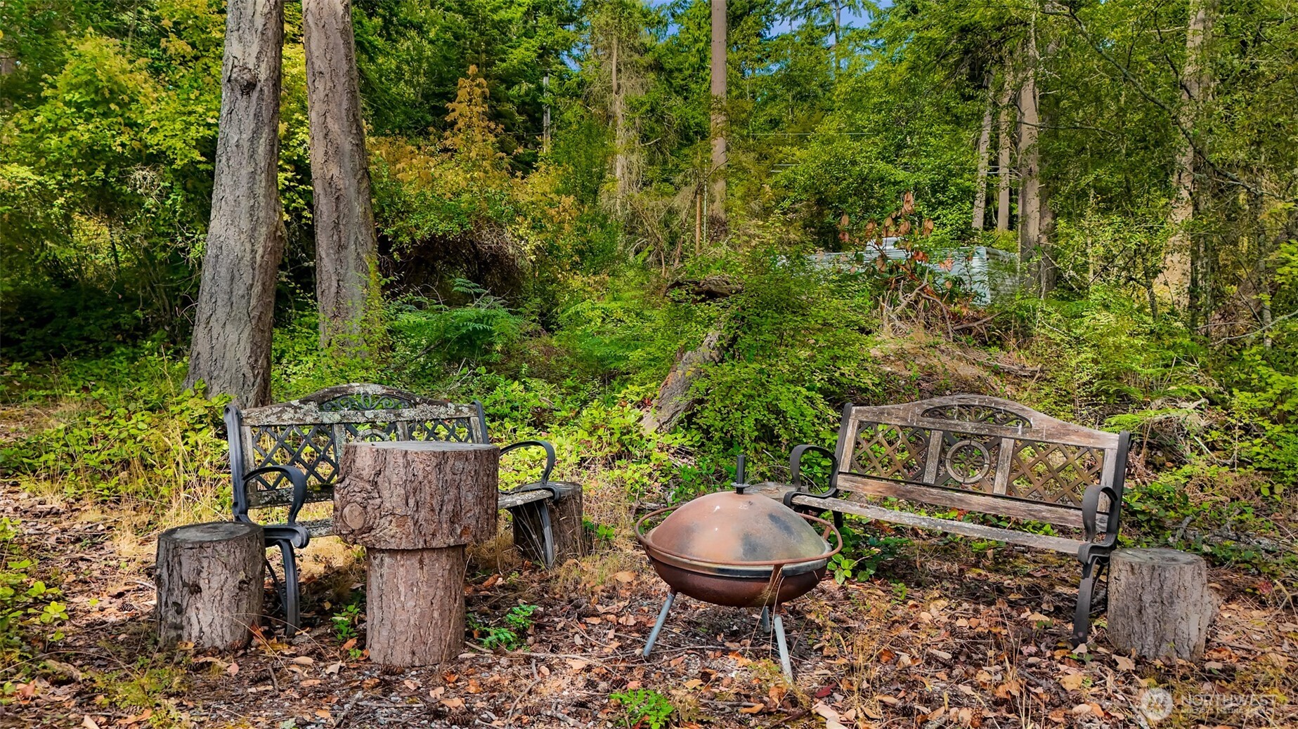 179 South Harrington Road Coupeville, WA 98239 - Photo 14 of 19 a view of a chairs and table in the backyard