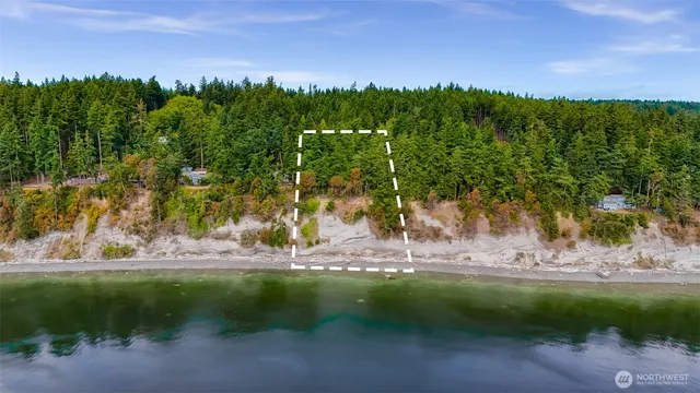 a view of a road with a building in the background