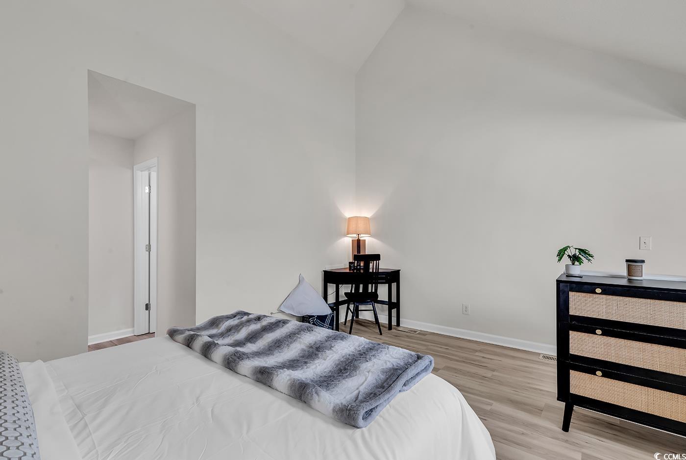 400 Cambridge Circle, Unit L7 Murrells Inlet, SC 29576 - Photo 29 of 36 Bedroom featuring baseboards, vaulted ceiling, and