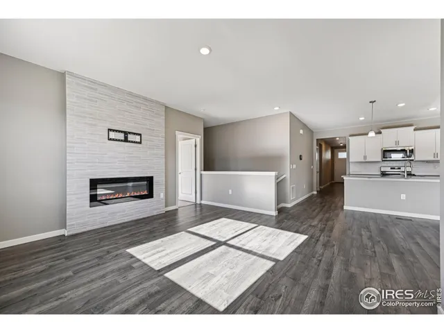 a view of kitchen with wooden floor