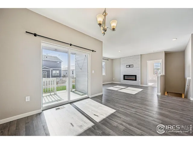 a stone house with a fireplace