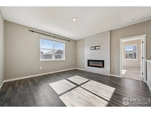 a view interior of a house and an empty room with wooden floor