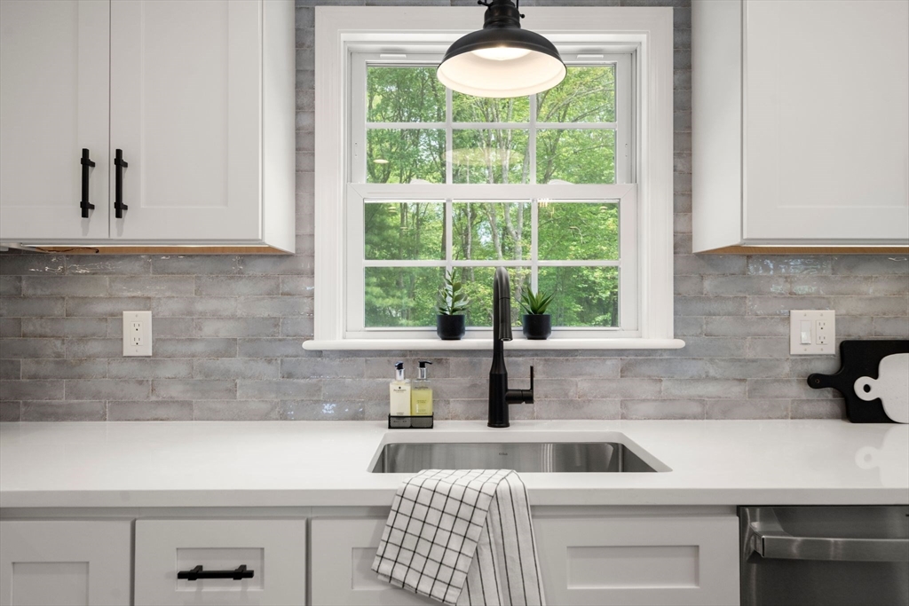 16 Churchill Road Plympton, MA 02367 - Photo 7 of 42 a kitchen with a sink and a window