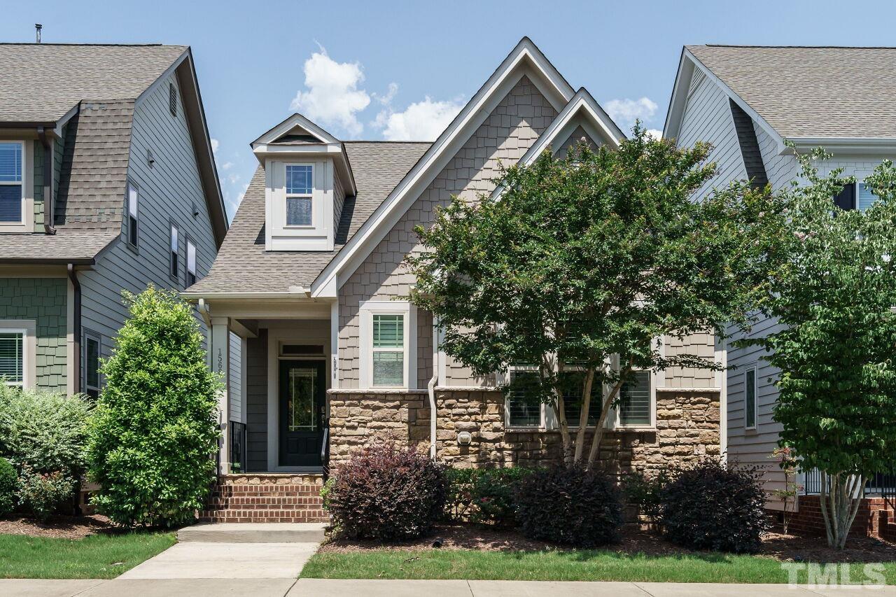 1568 Rodessa Run Raleigh, NC 27607 - Photo 1 of 25 front view of house with a yard and trees