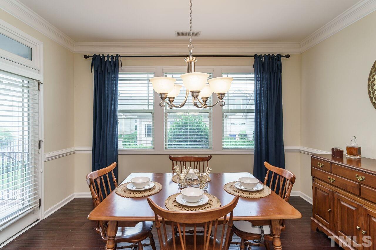 1568 Rodessa Run Raleigh, NC 27607 - Photo 9 of 25 a view of a dining room with furniture window and outside view