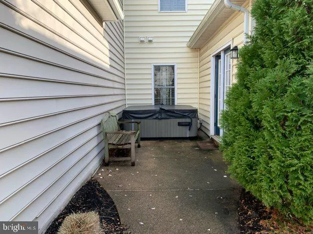 a yellow house with outdoor space