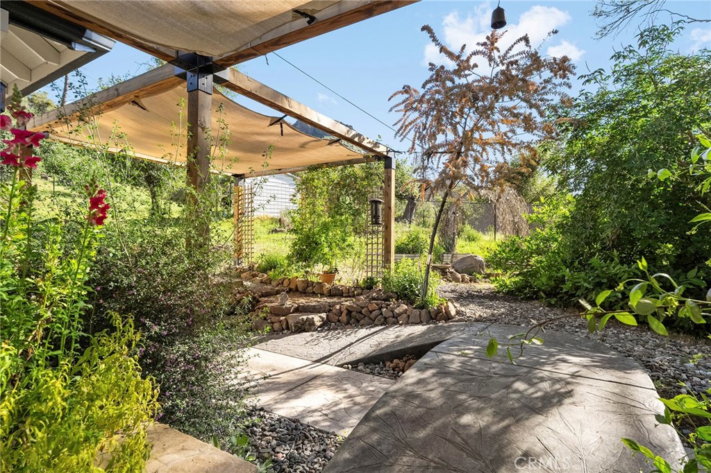 2262 Honey Run Road Chico, CA 95928 - Photo 42 of 74 a backyard of a house with lots of green space