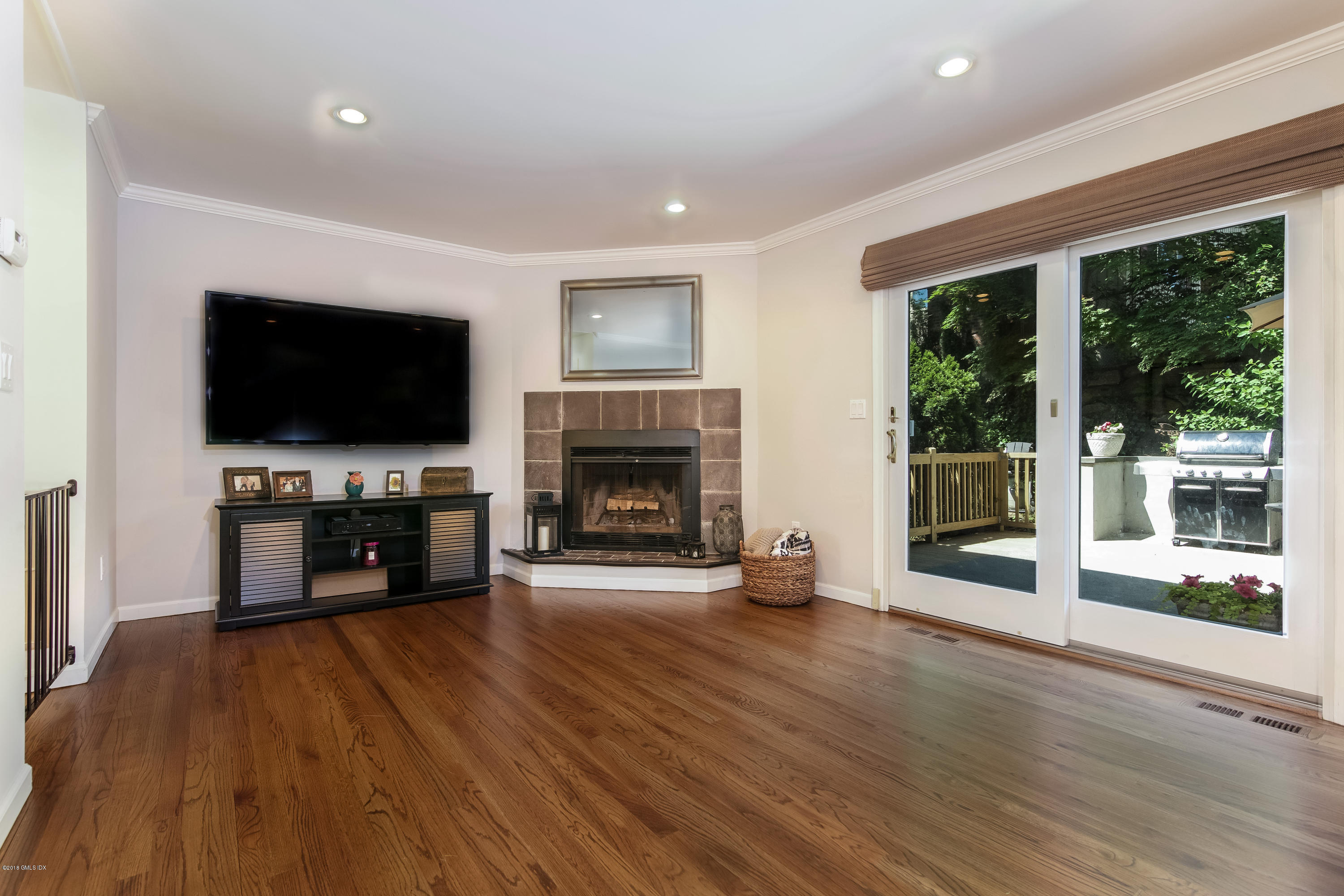22 Livingston Place, Unit D Greenwich, CT 06830 - Photo 10 of 17 a living room with furniture and a flat screen tv