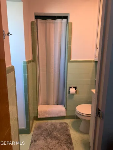 a bathroom with a sink and toilet