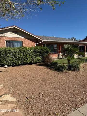 a front view of house with a yard