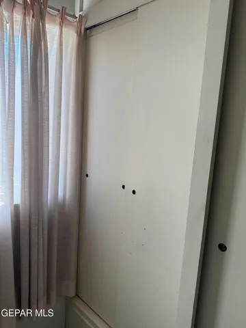 a bathroom with a toilet sink and vanity