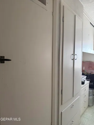 a room with storage and utility