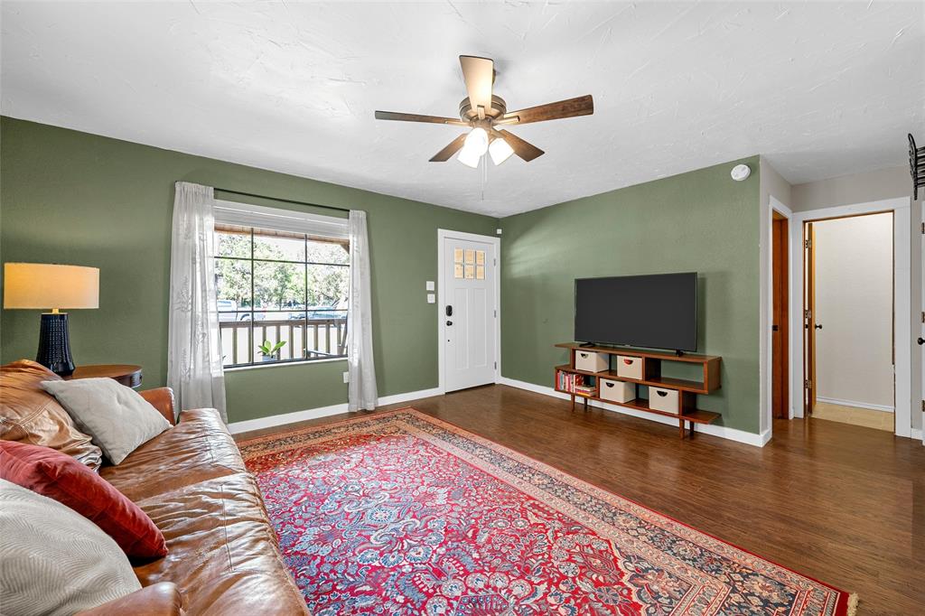 3000 North 15th A Street Waco, TX 76708 - Photo 7 of 24 a bedroom with furniture window and a flat screen tv