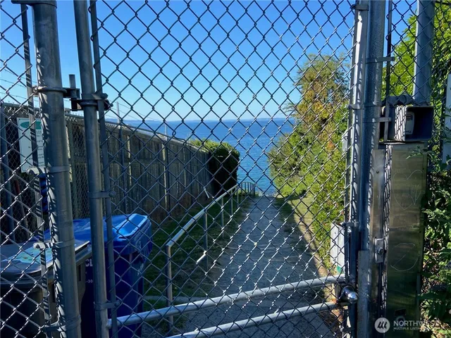 a bird view of a house with a tree