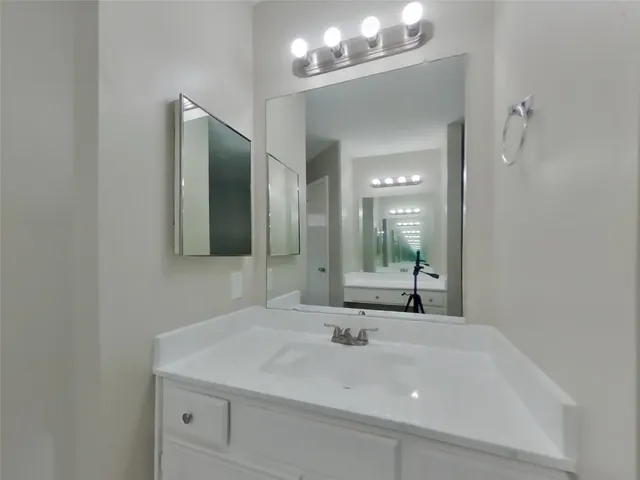 a bathroom with a bathtub and a toilet