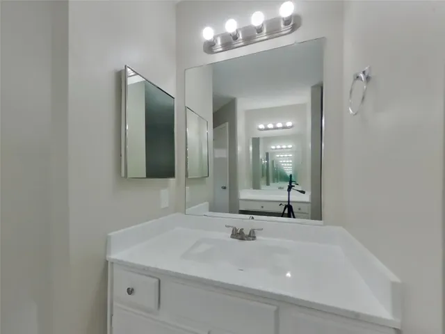 a bathroom with a bathtub and a toilet