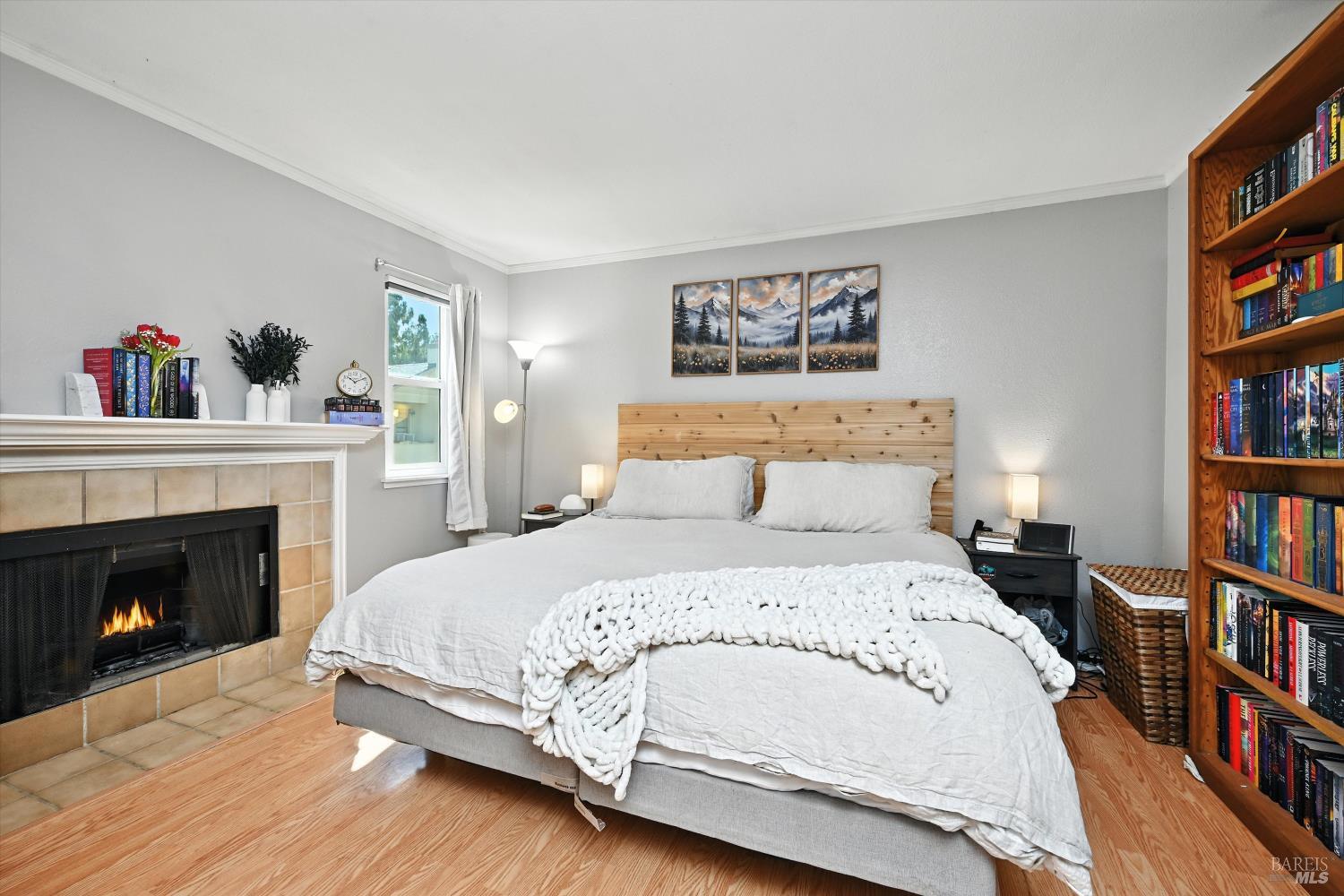 27 Fredrick Drive Rohnert Park, CA 94928 - Photo 14 of 26 a spacious bedroom with a bed and a book shelf