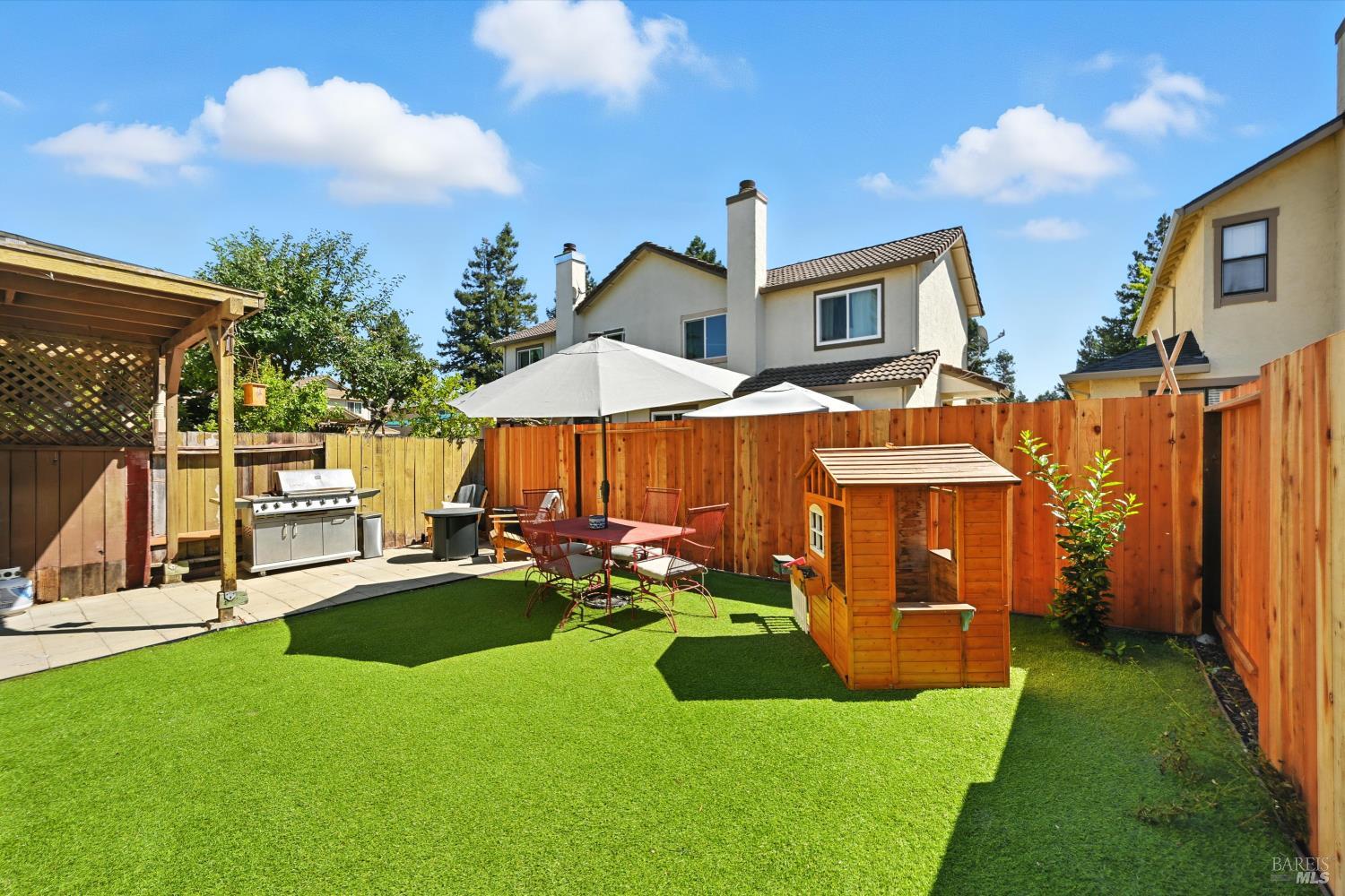 27 Fredrick Drive Rohnert Park, CA 94928 - Photo 22 of 26 a view of a house with backyard and porch