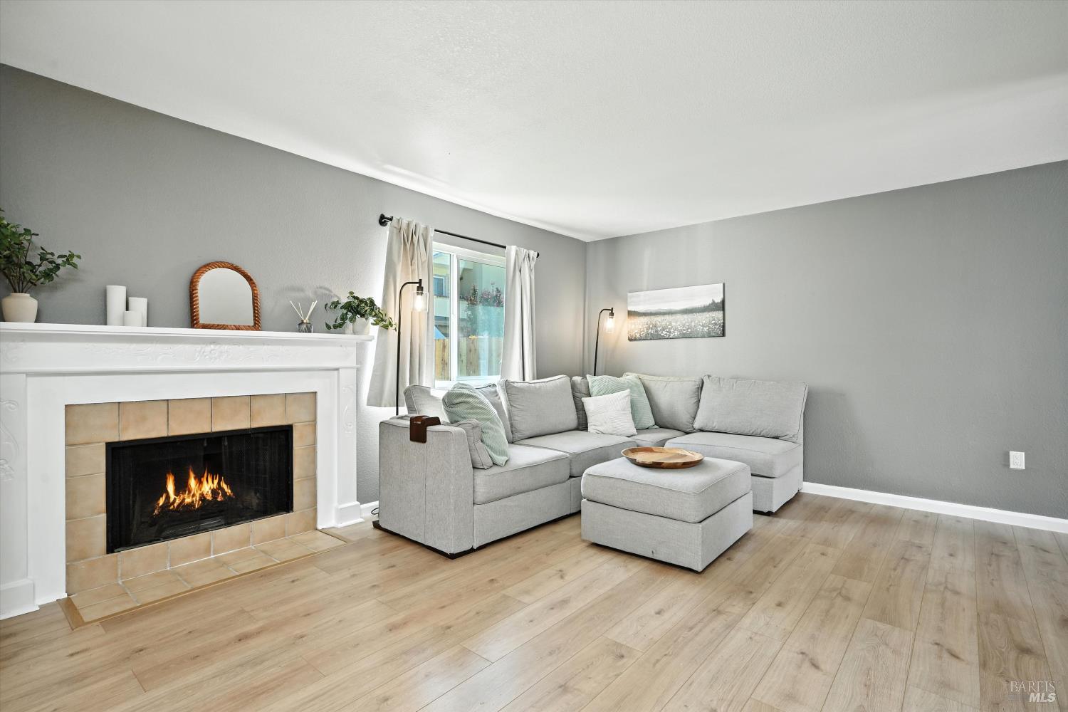27 Fredrick Drive Rohnert Park, CA 94928 - Photo 4 of 26 a living room with furniture and a fireplace
