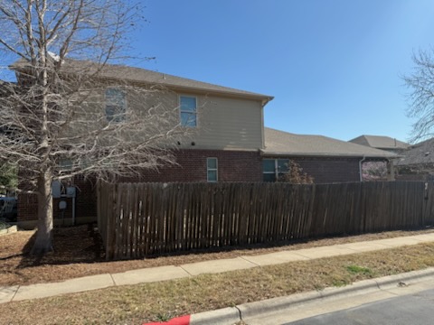351 Wincliff Drive Buda, TX 78610 - Photo 23 of 25 View of side of property featuring brick siding