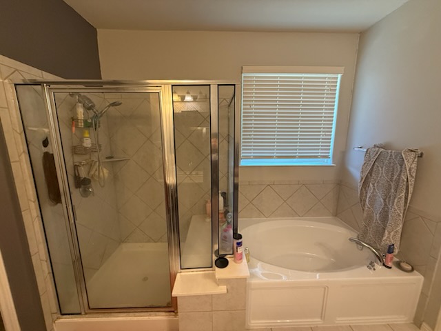 351 Wincliff Drive Buda, TX 78610 - Photo 25 of 25 Bathroom with a shower stall and a garden tub