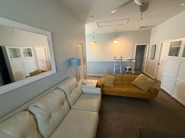 351 Wincliff Drive Buda, TX 78610 - Photo 3 of 25 Living area featuring carpet floors and ceiling fan
