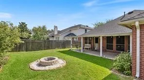 a view of a pathway with a house in the background
