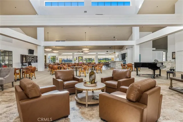 a view of a swimming pool with a lounge chairs