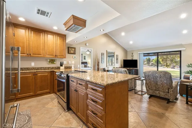 a bathroom with a granite countertop sink mirror and a shower