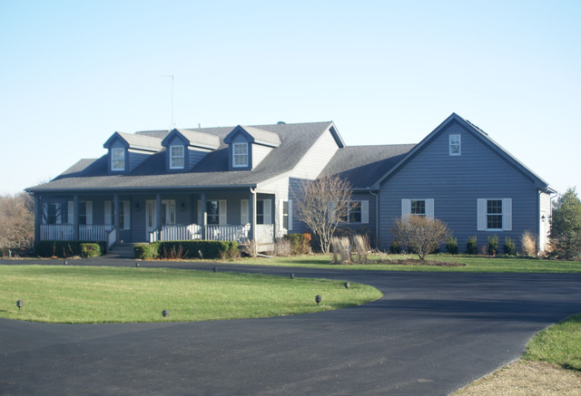 43W145 Campton Hills Road Elburn, IL 60119 - Photo 1 of 23 a front view of house with outdoor seating