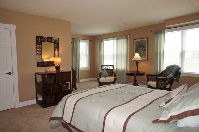43W145 Campton Hills Road Elburn, IL 60119 - Photo 13 of 23 a bedroom with a bed and a dresser next to a window