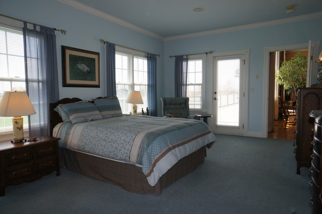 43W145 Campton Hills Road Elburn, IL 60119 - Photo 14 of 23 a spacious bedroom with a bed and a window