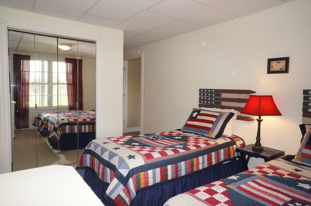 43W145 Campton Hills Road Elburn, IL 60119 - Photo 16 of 23 a bedroom with a bed and a lamp