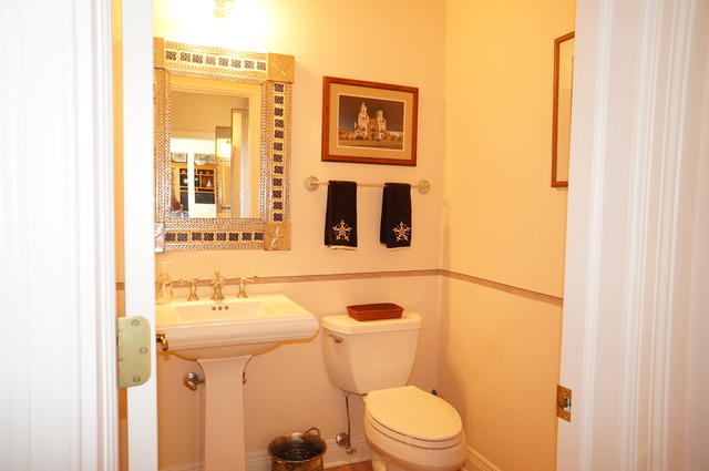 43W145 Campton Hills Road Elburn, IL 60119 - Photo 18 of 23 a bathroom with a toilet sink and mirror