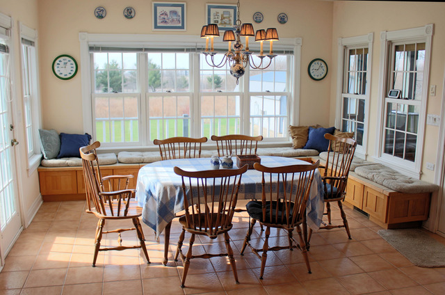 43W145 Campton Hills Road Elburn, IL 60119 - Photo 6 of 23 a dining room with furniture a rug and a large window