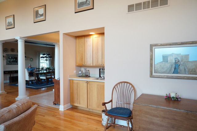 43W145 Campton Hills Road Elburn, IL 60119 - Photo 10 of 23 a workspace with furniture and wooden floor