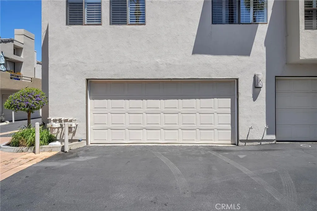 4277 Las Virgenes Road Calabasas, CA 91302 - Photo 22 of 28 The direct access garage is at the end. Front door is right around the corner. The perfect location. Views of the main pool.