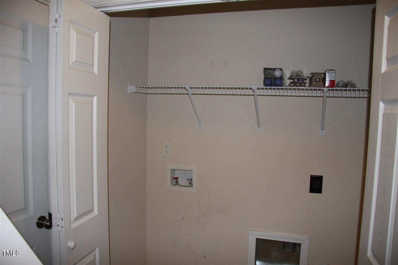 1045 Summerhouse Road Cary, NC 27519 - Photo 16 of 20 a close view of a refrigerator in kitchen