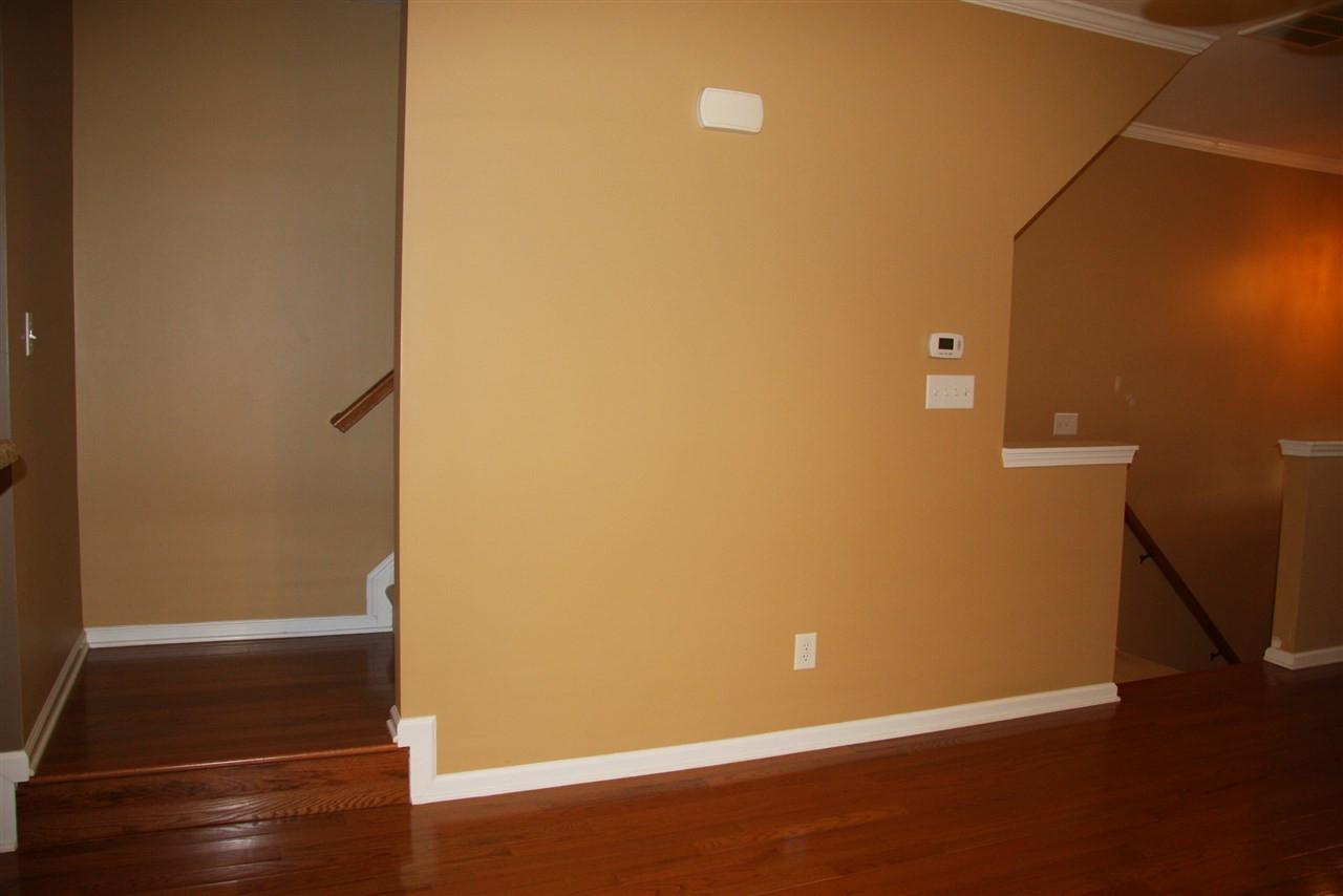 1045 Summerhouse Road Cary, NC 27519 - Photo 8 of 20 a view of an empty room
