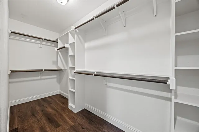 a view of an empty walk in closet