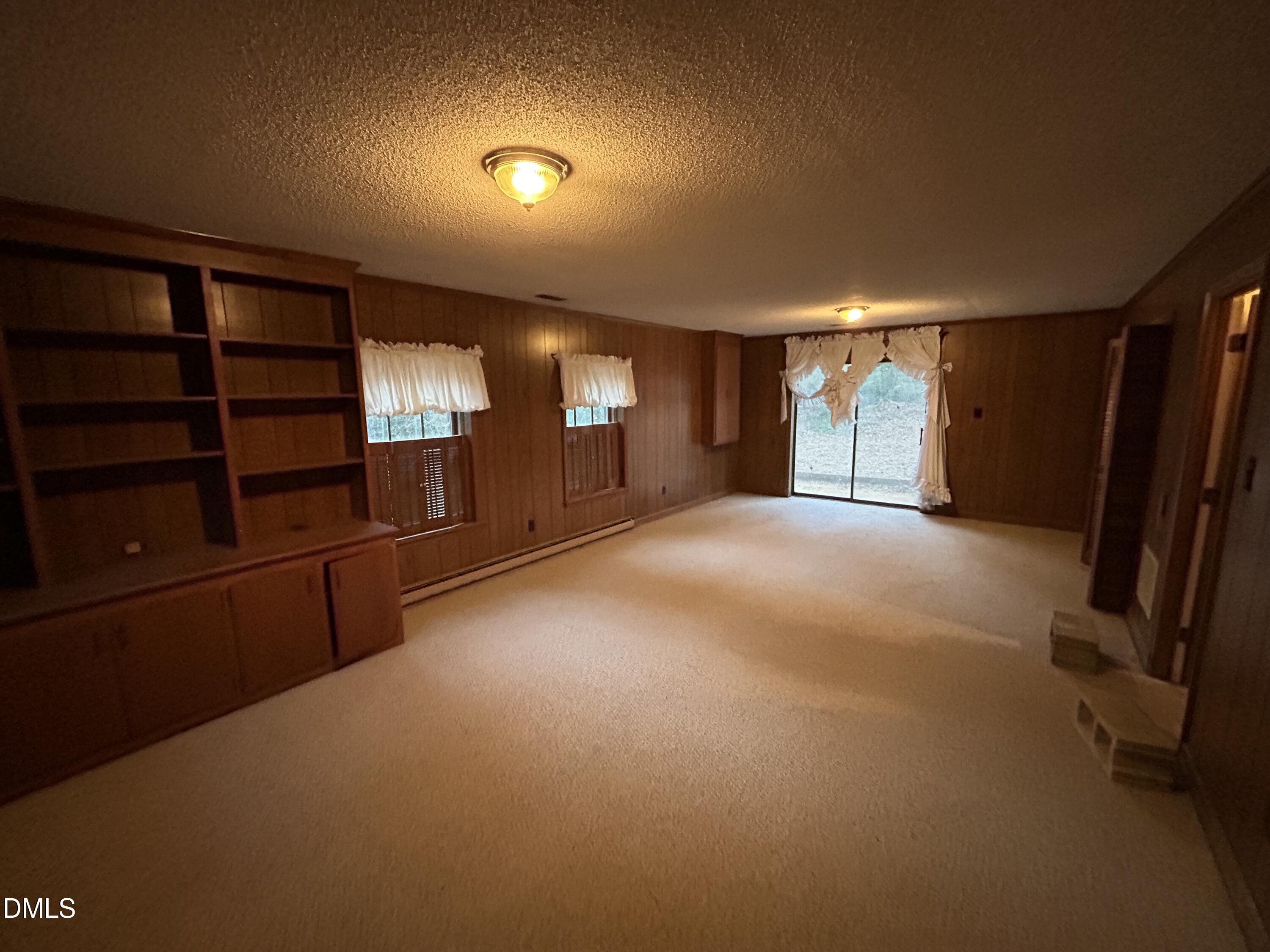 2912 Oxford Road Henderson, NC 27536 - Photo 24 of 25 a view of a livingroom with furniture