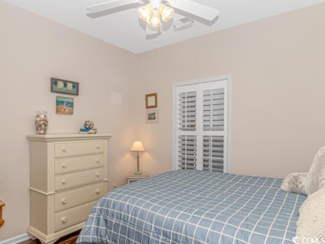 5804 Longwood Drive, Unit 203 Murrells Inlet, SC 29576 - Photo 19 of 31 Bedroom featuring ceiling fan