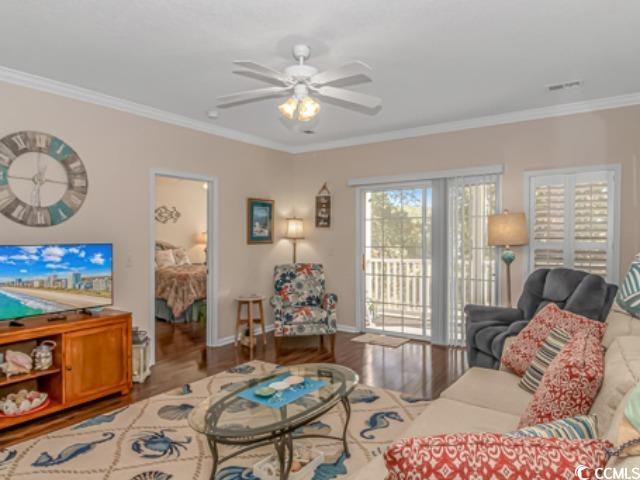 5804 Longwood Drive, Unit 203 Murrells Inlet, SC 29576 - Photo 9 of 31 Living room featuring crown molding, wood-type flooring, and ceiling fan
