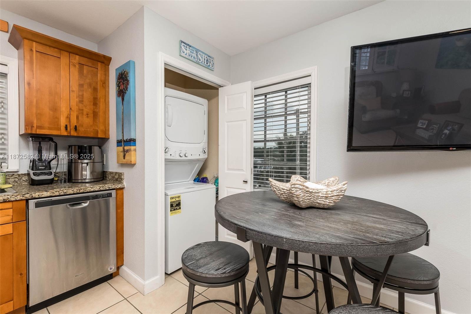 325 Calusa Street, Unit 320 Key Largo, FL 33037 - Photo 23 of 52 a view of a dining room with furniture