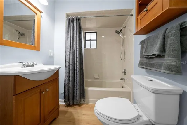 a living room with lots of furniture and lots of furniture