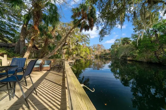 a view of wooden floor and a lake view